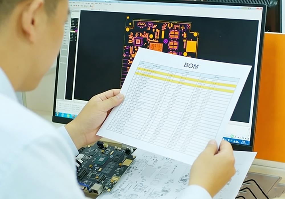 An-engineer-is-reviewing-the-BOM