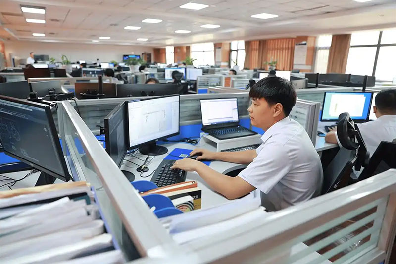The-engineer-checks-the-BOM-at-his-desk.