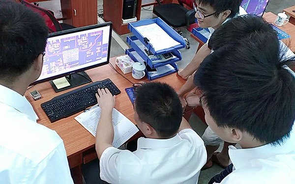 Engineering team reviewing PCB design files and BOM details before quotation